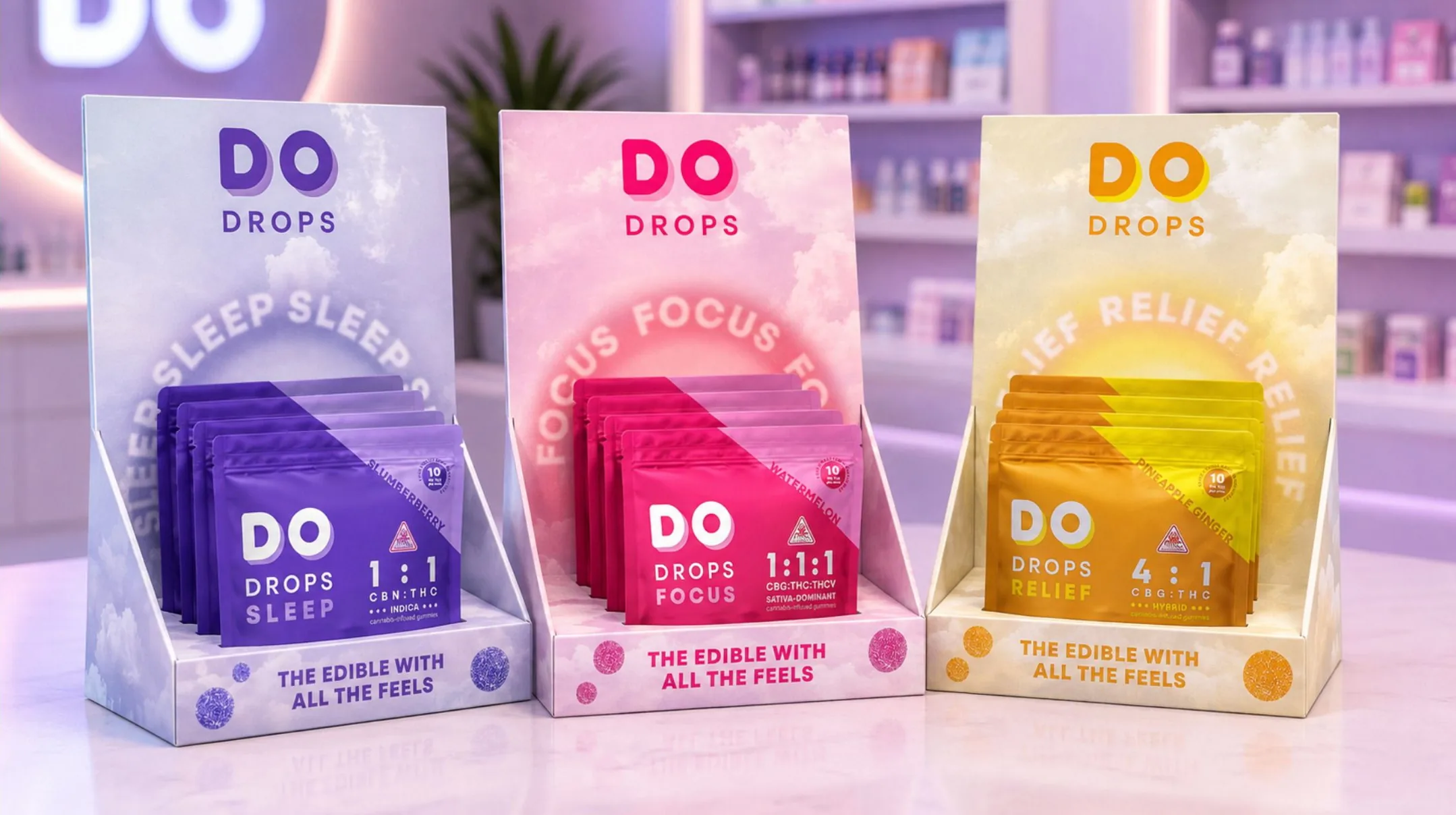 Sleep, Focus and Relief modular counter displays side by side on a dispensary counter, each pouch fronted by its own glowing colour field and circular type.